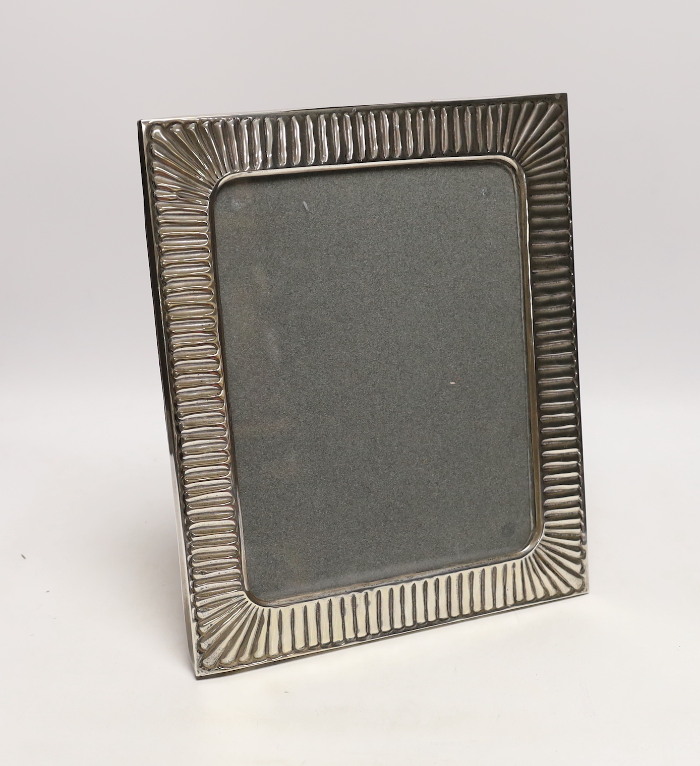 A continental 900 standard white metal rectangular photograph frame, 30.7cm, with fluted border.